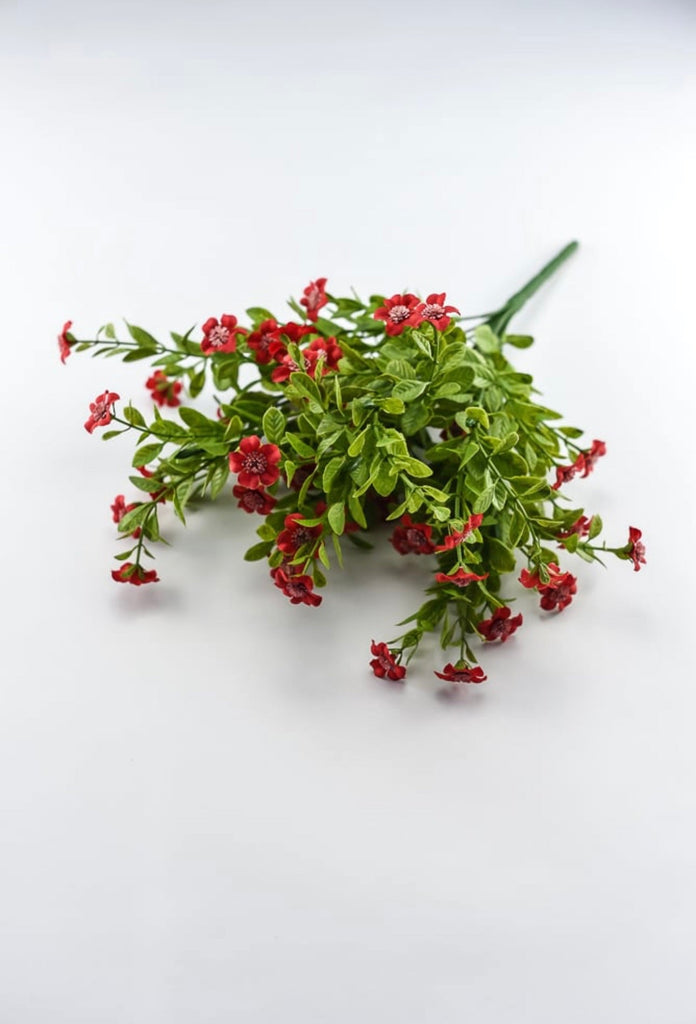 Red filler flower and greenery bush