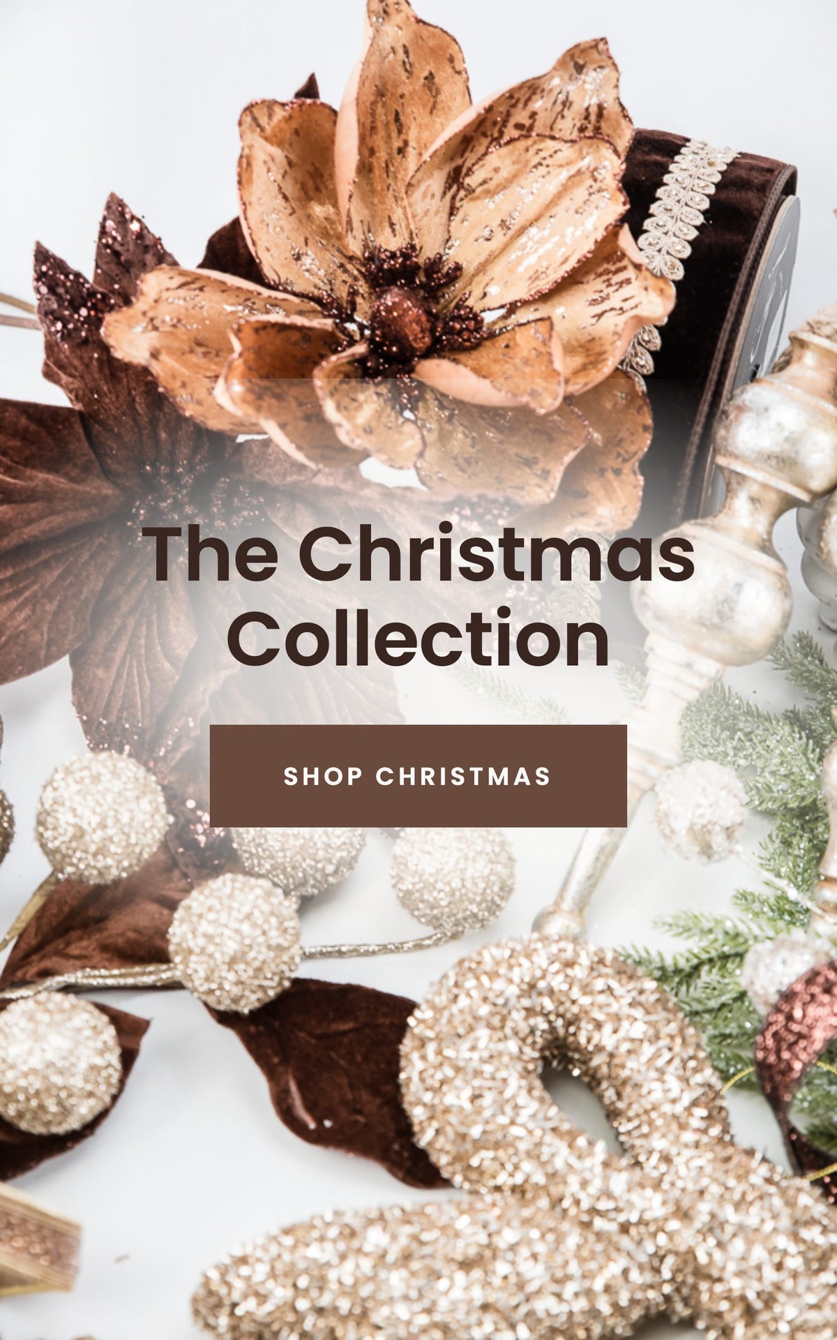 The Christmas Collection banner in bronze and brown with a shop Christmas call to action button