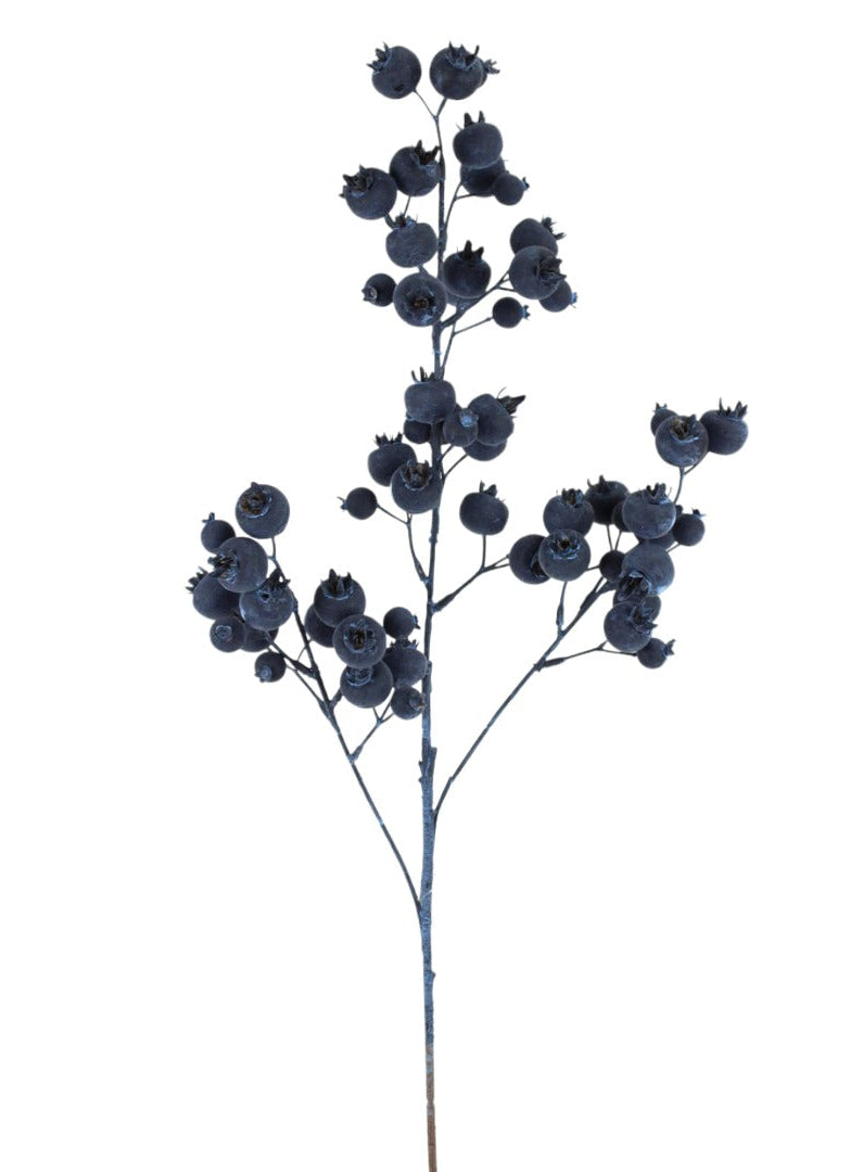 An artificial blueberry stem with dark blue to black berries on thin branches, isolated on a solid white background.