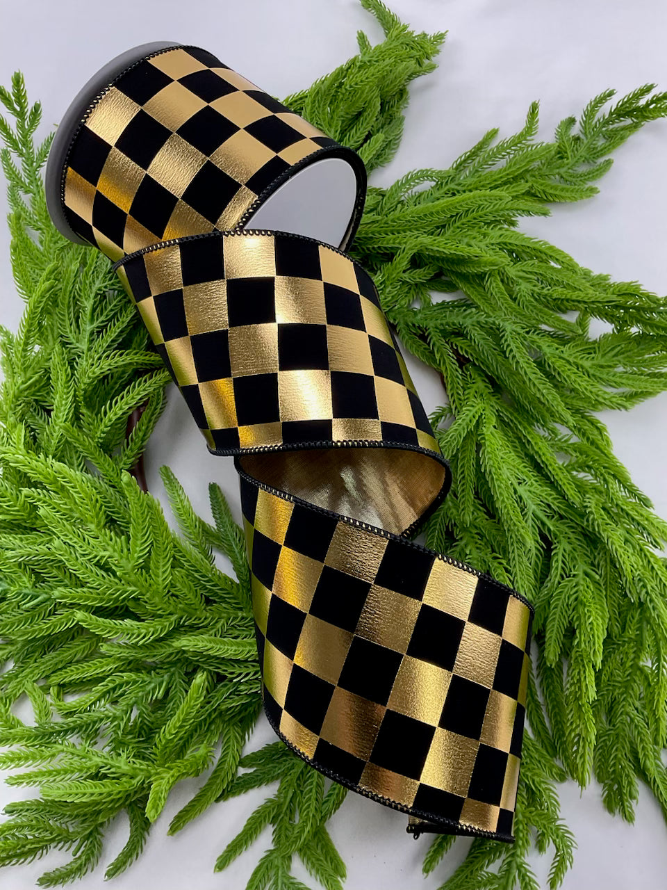 Gold and black check wired ribbon 4”
