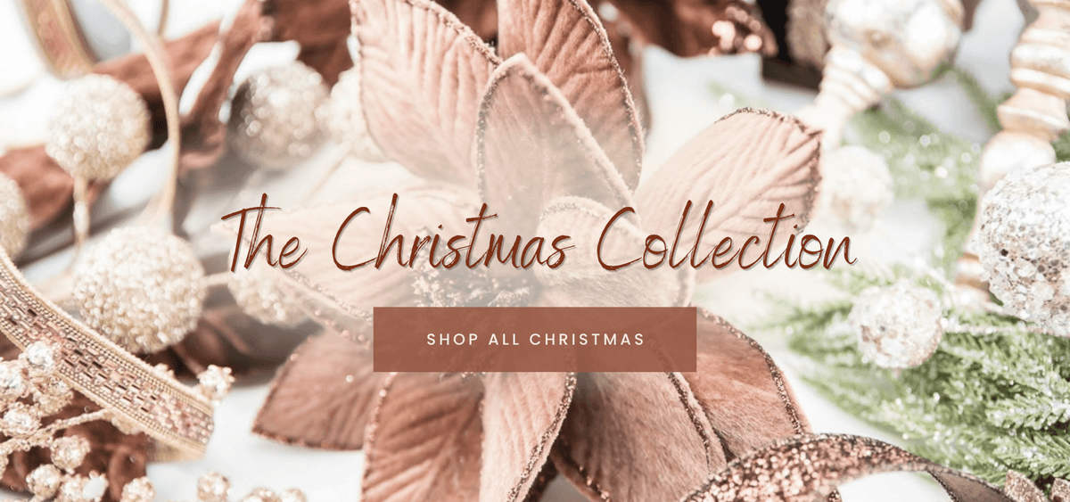 The Christmas Collection banner with a shop all christmas button
