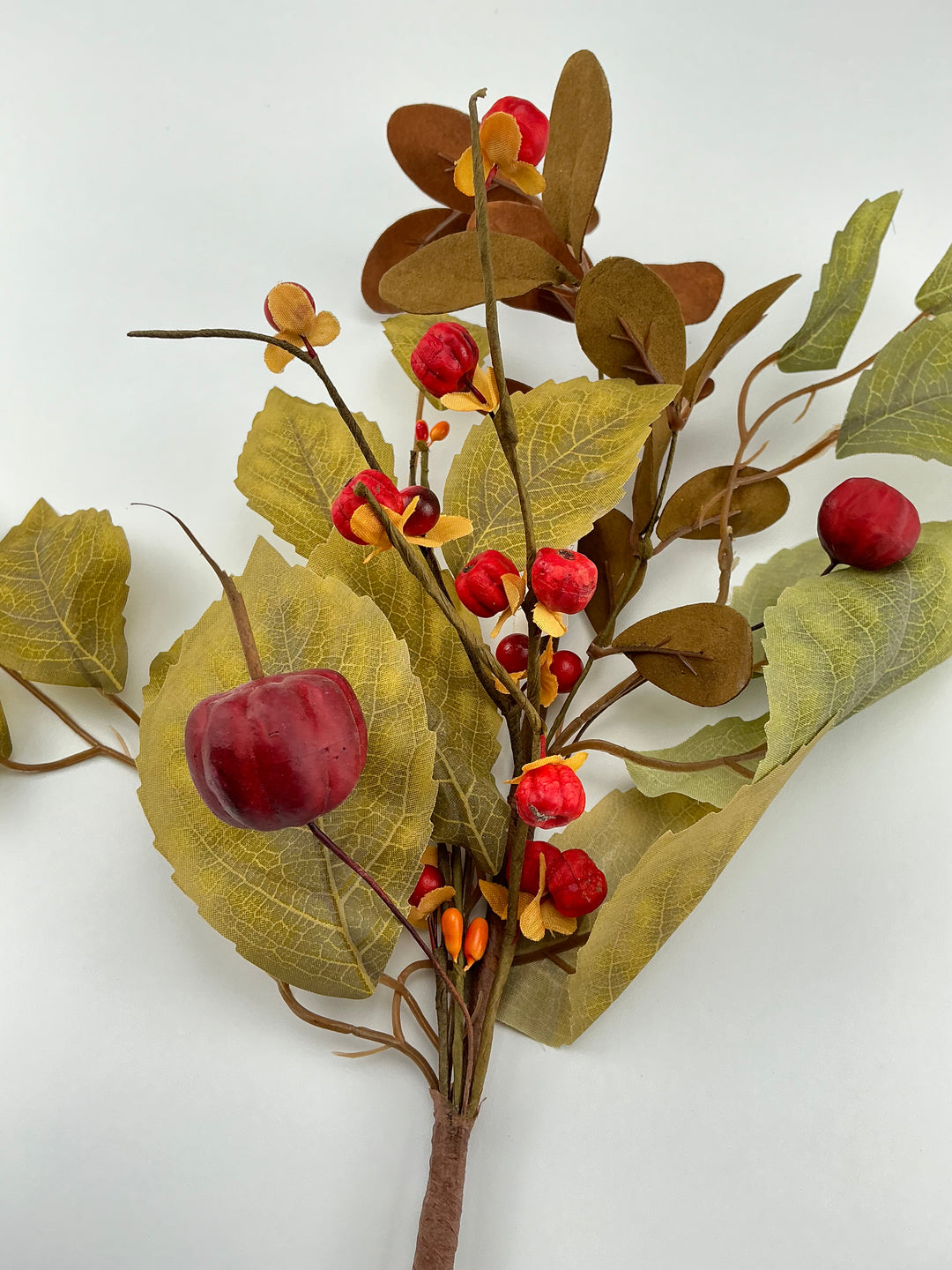 Mini pumpkins, rose leaves and bittersweet pick