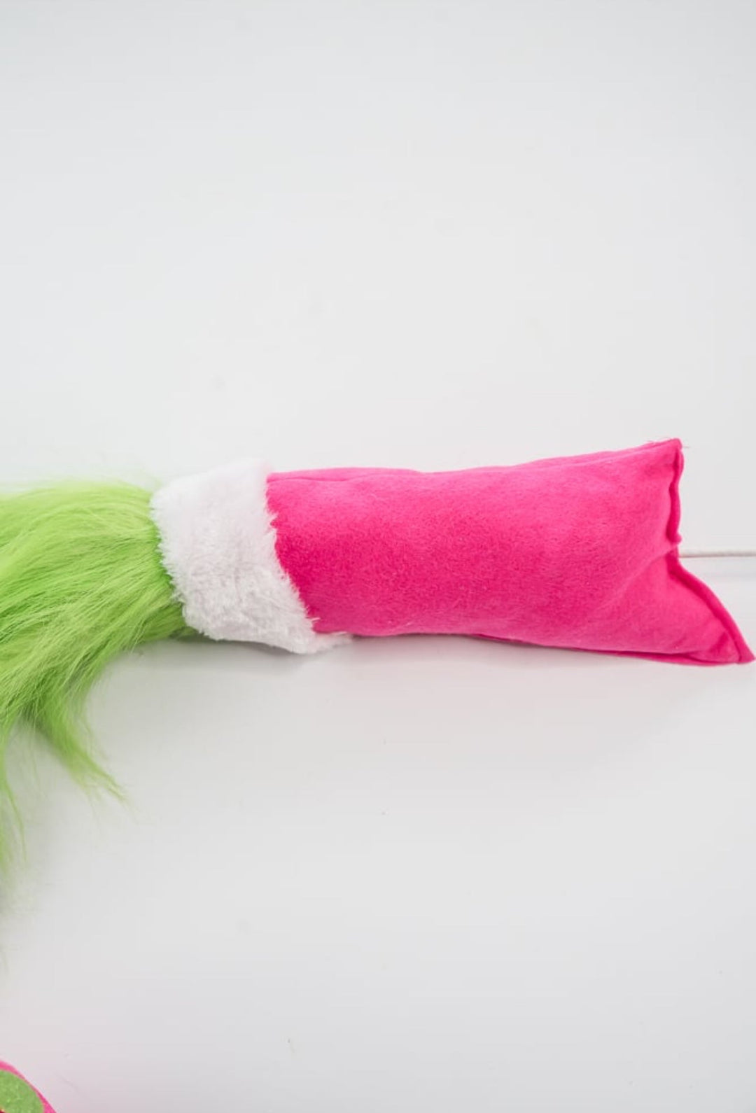 Green fluffy monster hand holding pink ornament - Greenery MarketPicksGM2116PKGN