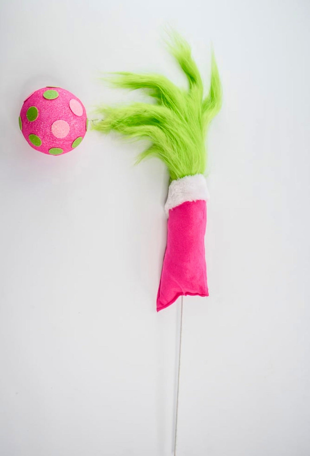 Green fluffy monster hand holding pink ornament - Greenery MarketPicksGM2116PKGN