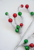 Red and green balls on silver tinsel wired stems - Greenery Market63690