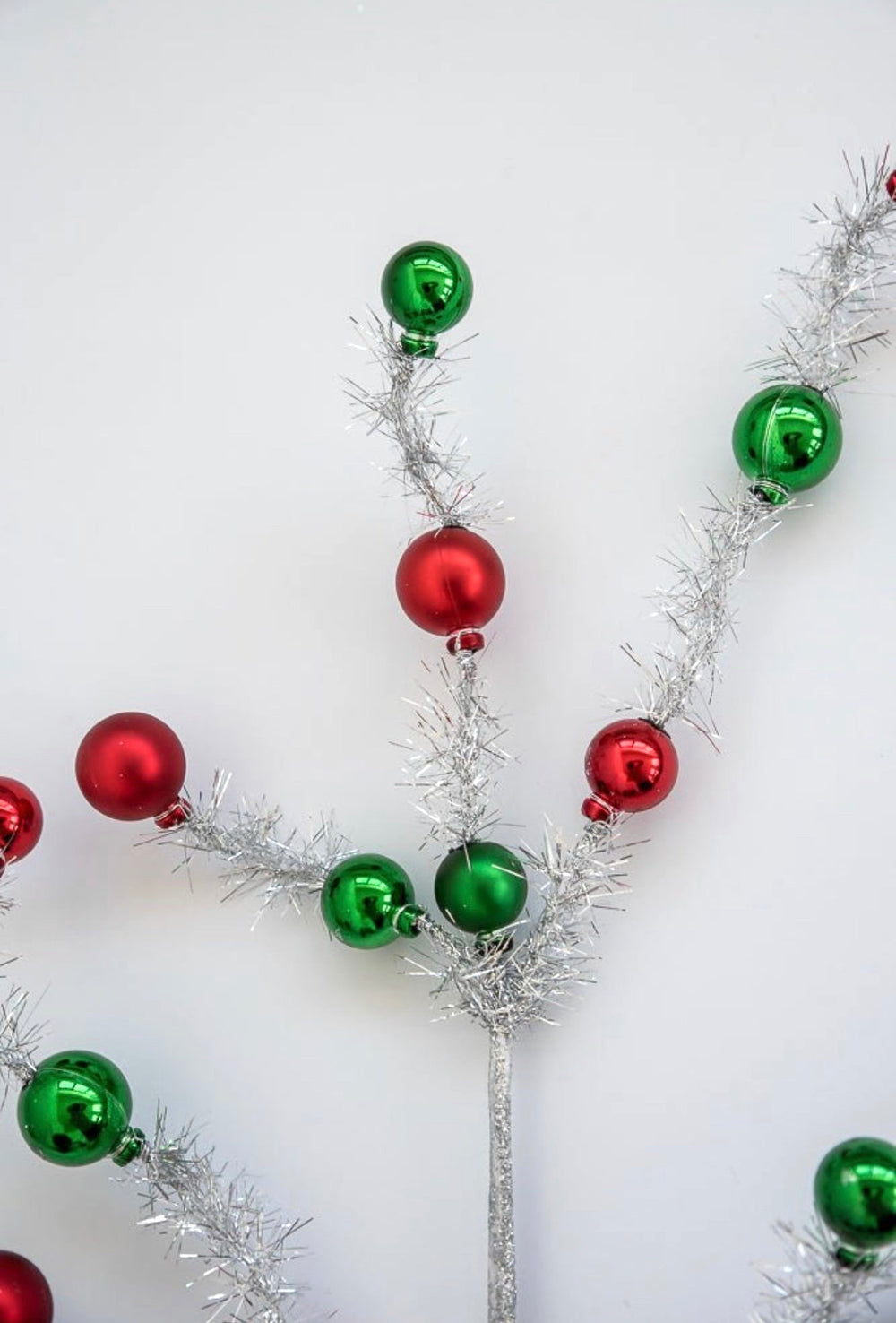 Red and green balls on silver tinsel wired stems - Greenery Market63690