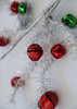Red and green bells on silver tinsel wired stems - Greenery Market63691